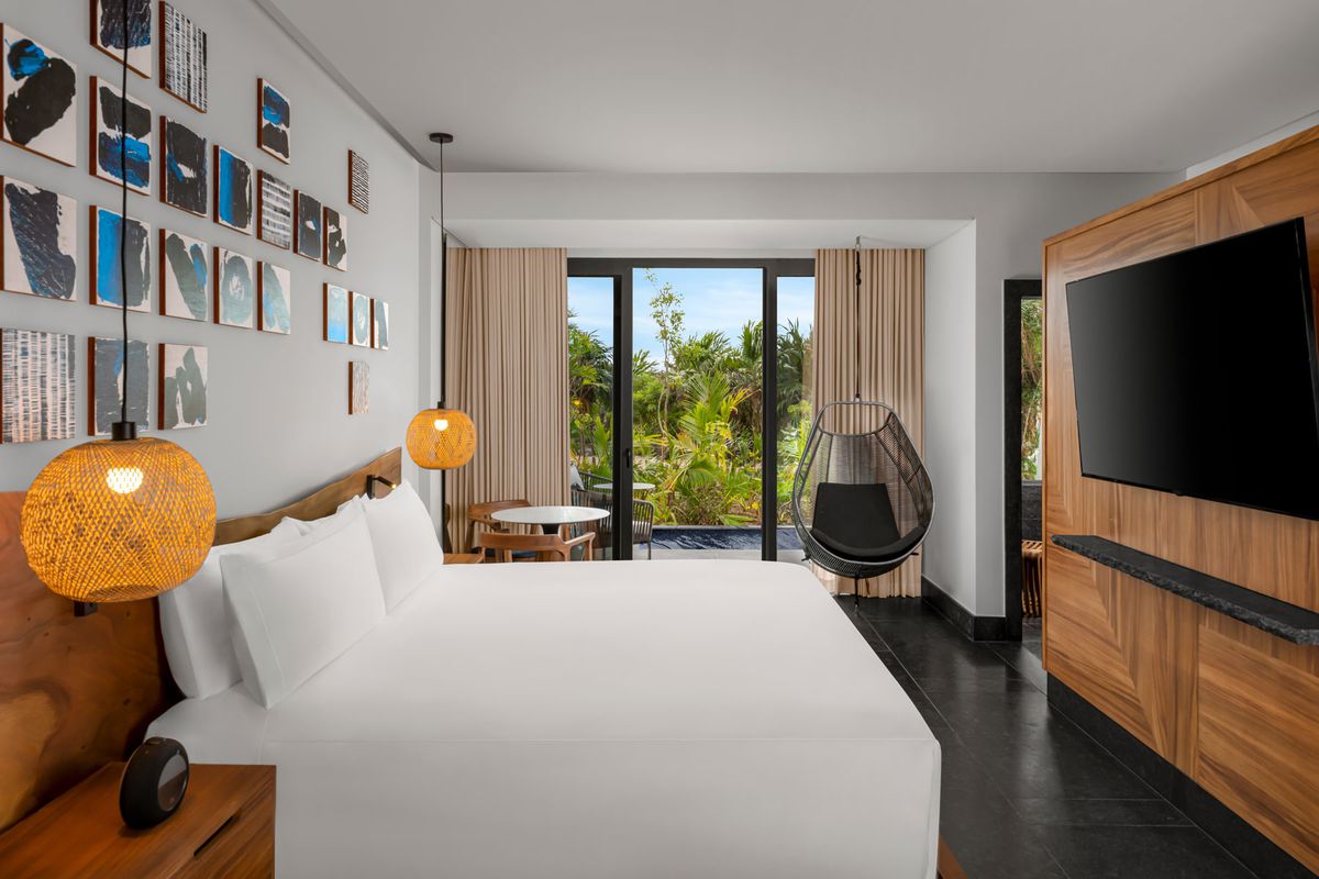 Conrad Tulum Riviera Maya's King Bed tropical guest room