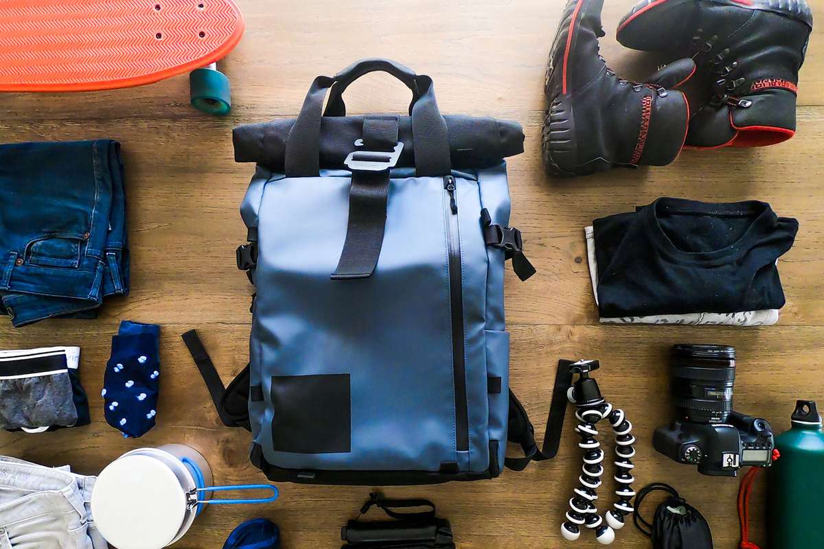Items to pack laid out with a bag