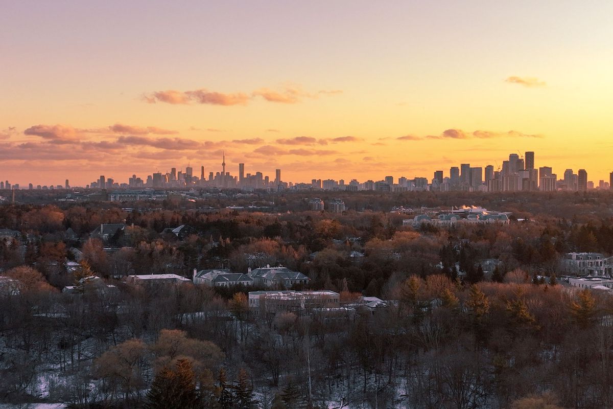Winter sunset in Toronto, Canada with distant view of skyline