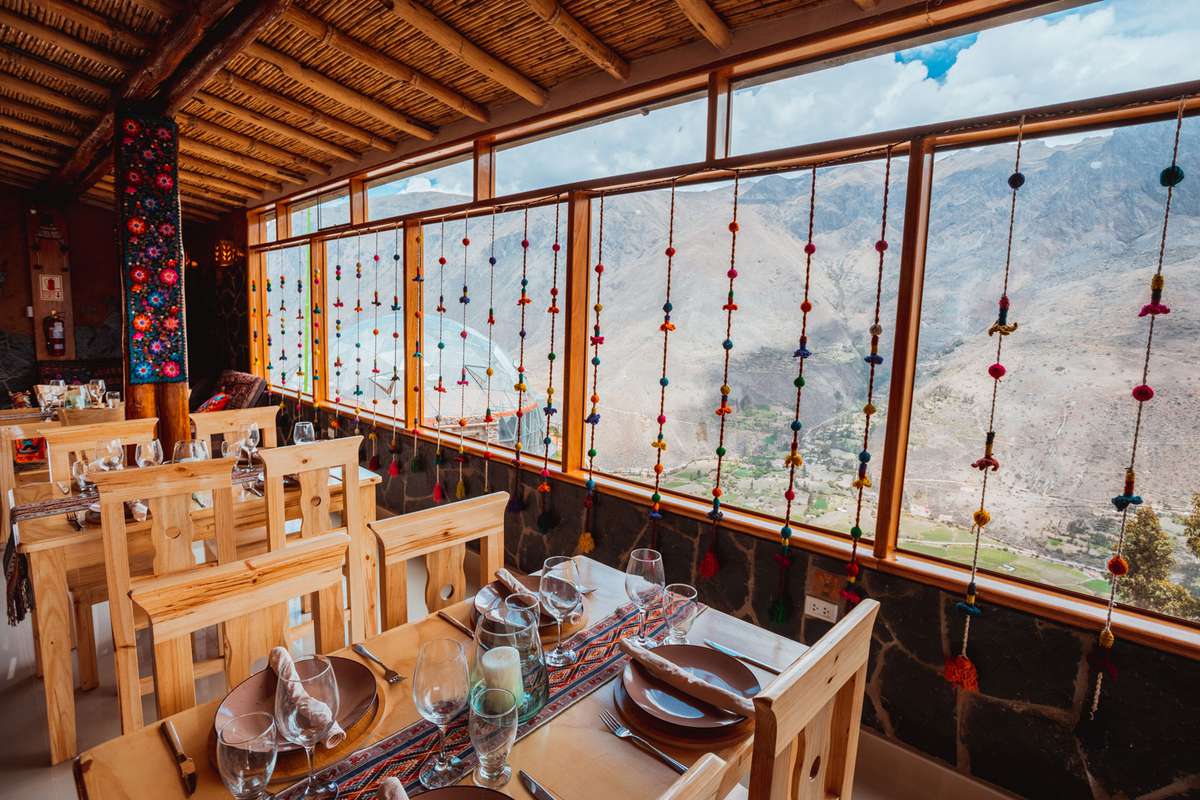 Luxury boutique hotel with clear dome structure nestled in the mountains of Peru. Panoramic views from inside guest room and restaurant