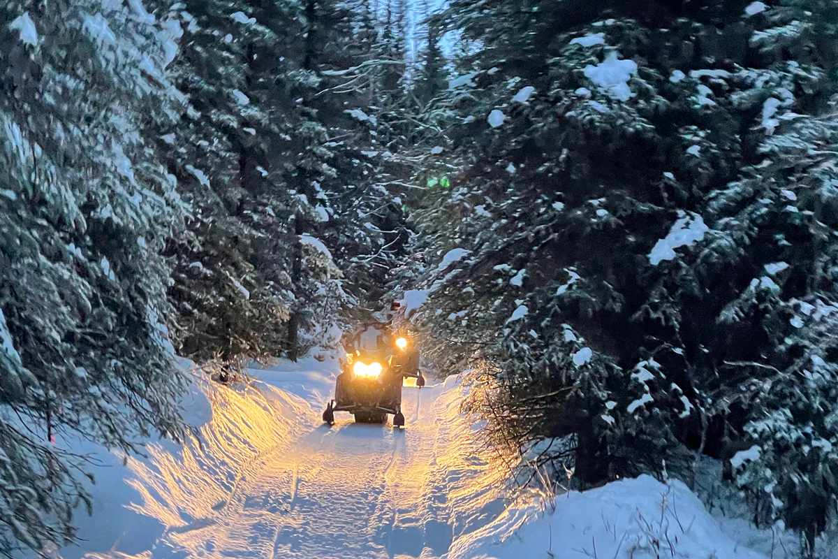 ATVing through snow with Alaska Backcountry Adventure Tours