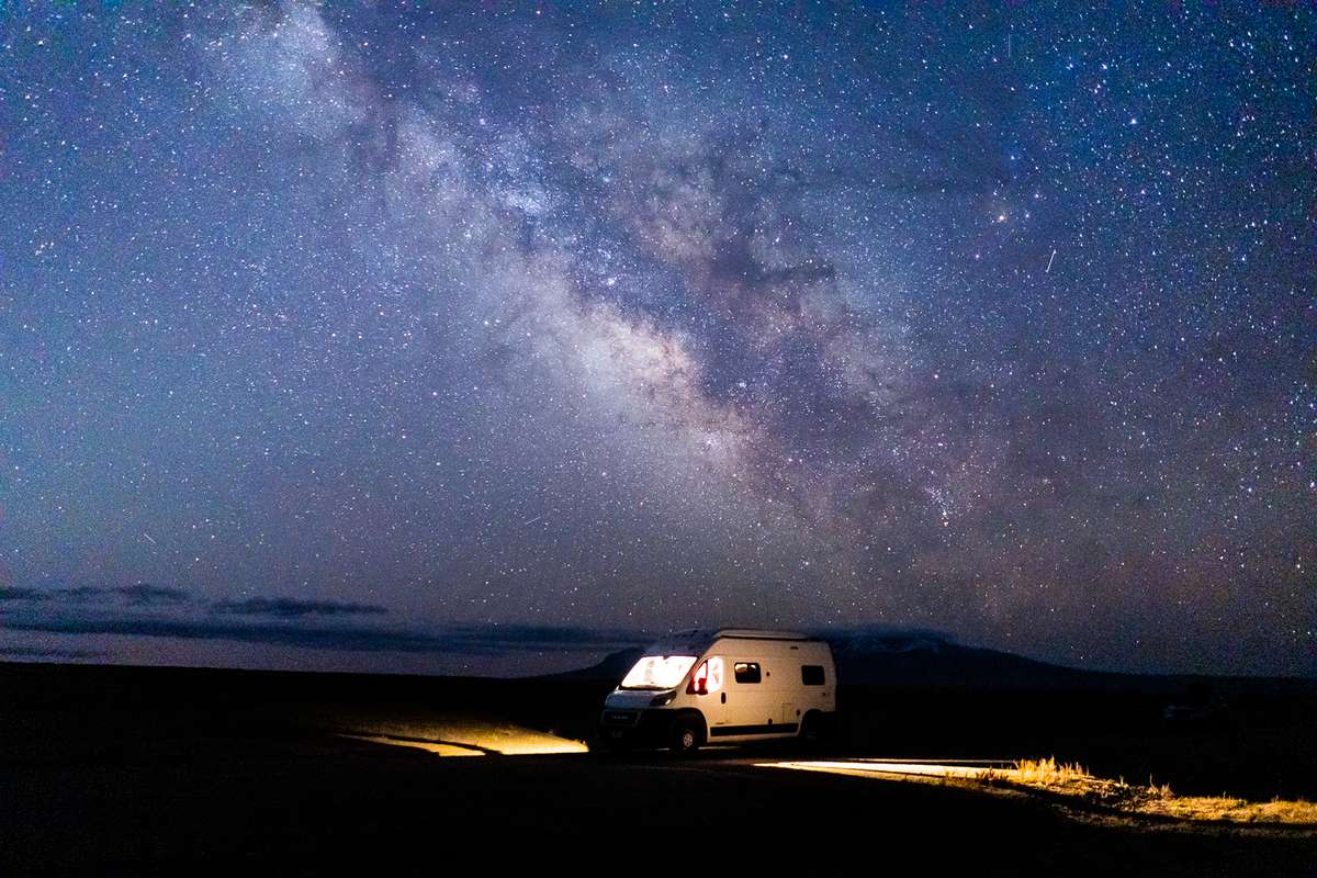 An RV under a starry sky