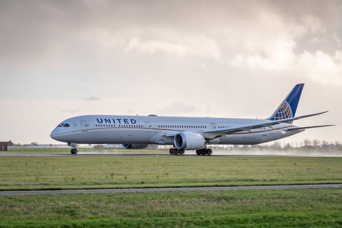 This is a picture of a Boeing 787 of United airlines taking off from Amsterdam Schiphol airport.