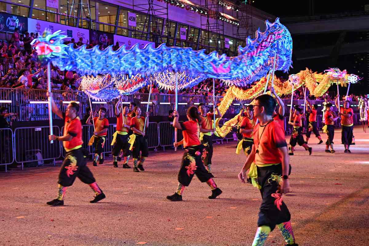 Performers participate in the annual Chinese Lunar New Year Chingay parade in Singapore on February 15, 2019. - The Chingay Parade is an annual performance street parade held in Singapore since 1974 to celebrate the Lunar New Year and multi-ethnic cultures.