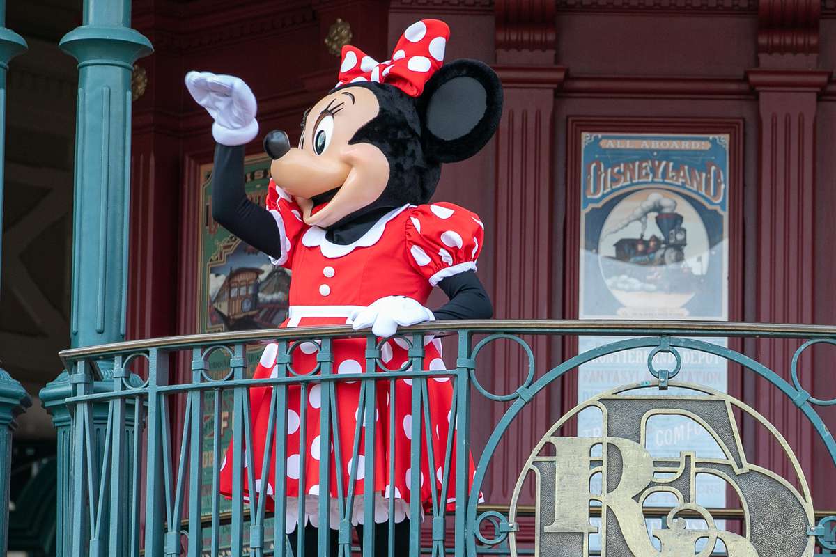Mickey Mouse waves at first visitors as Disneyland Paris parks reopen on June 17, 2021 in Paris, France.
