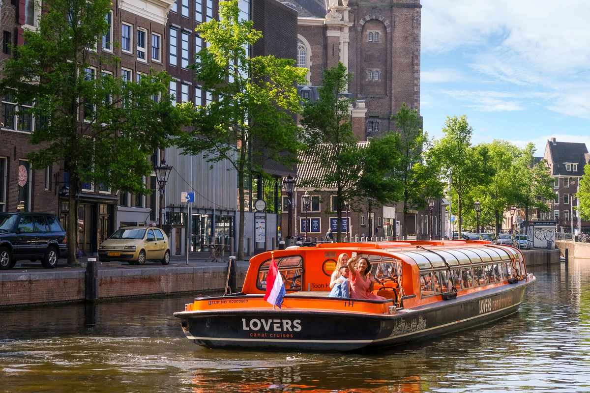 Tourists on an Amsterdam canal cruise