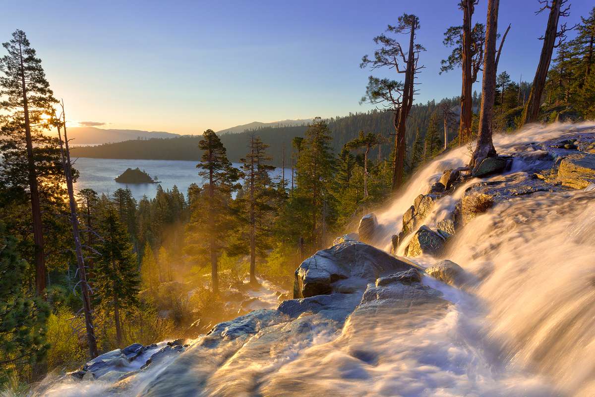 Sunrise overlooking Lake Tahoe's Emerald Bay in the background, with the upper portion of Lower Eagle Falls in the foreground