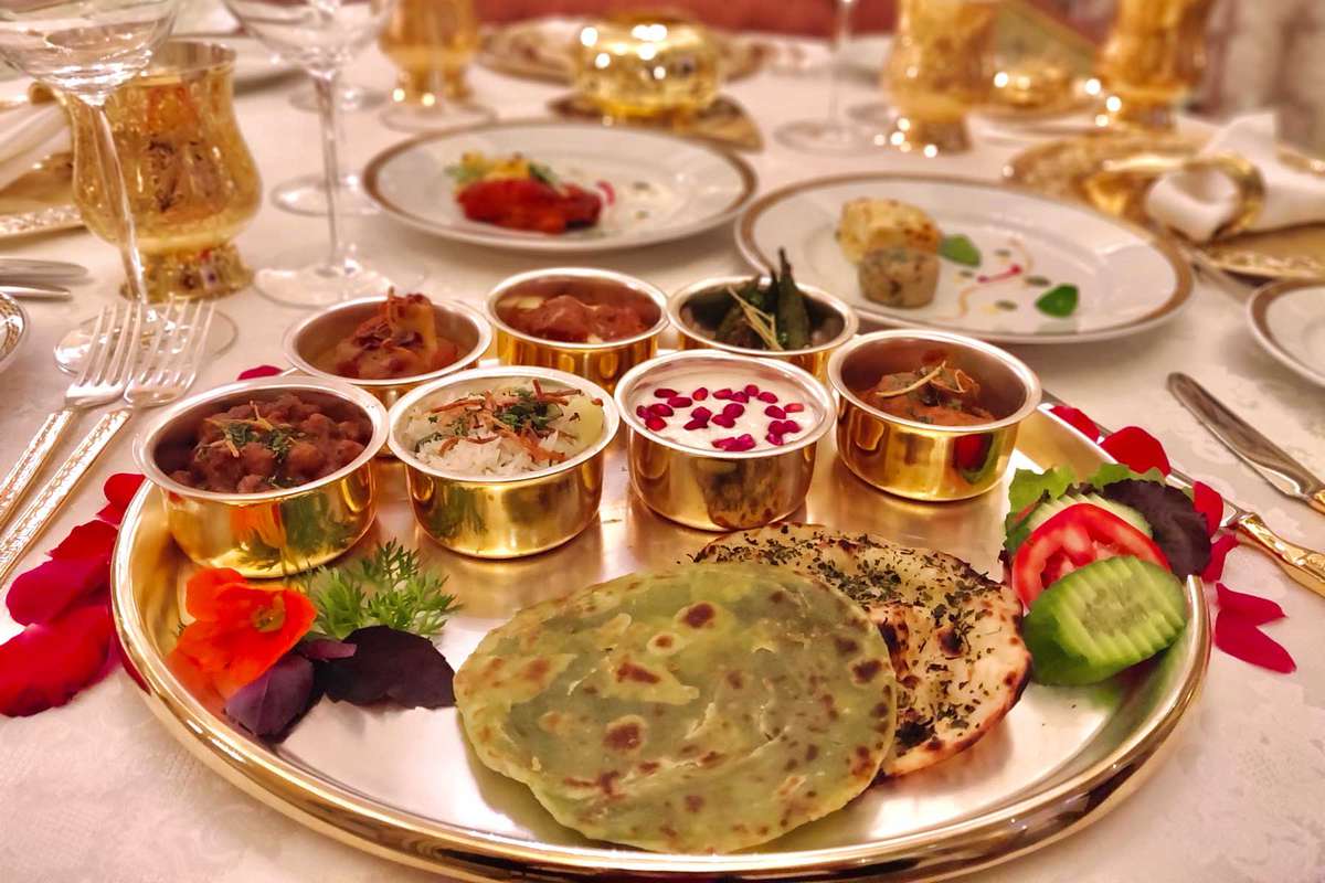 A plate of Indian cuisine at Suvarna Mahal at Rambagh Palace in Jaipur