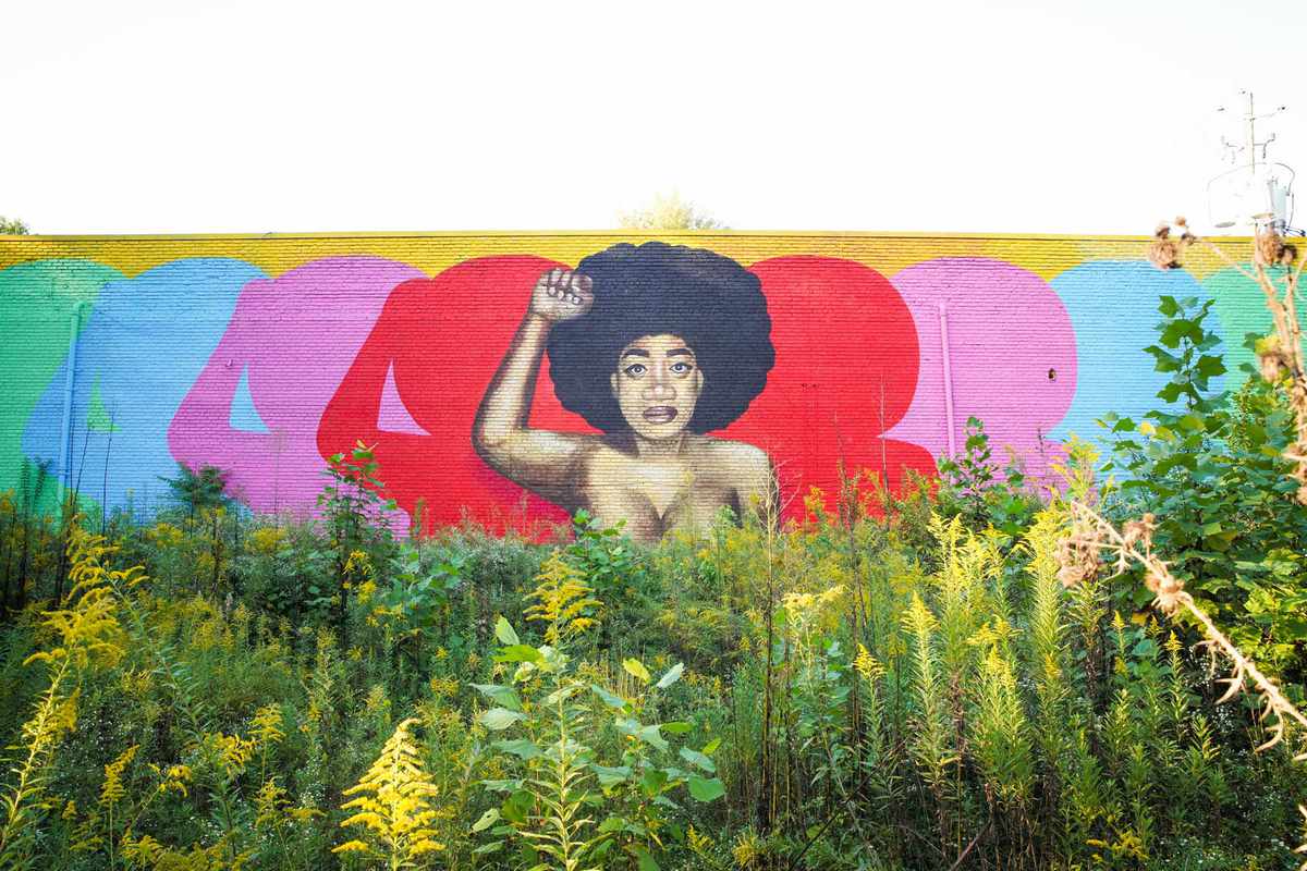 Black (Female) Power, a colorful mural by artist Mirage Vanguard at the Ormewood Square mall in Atlanta