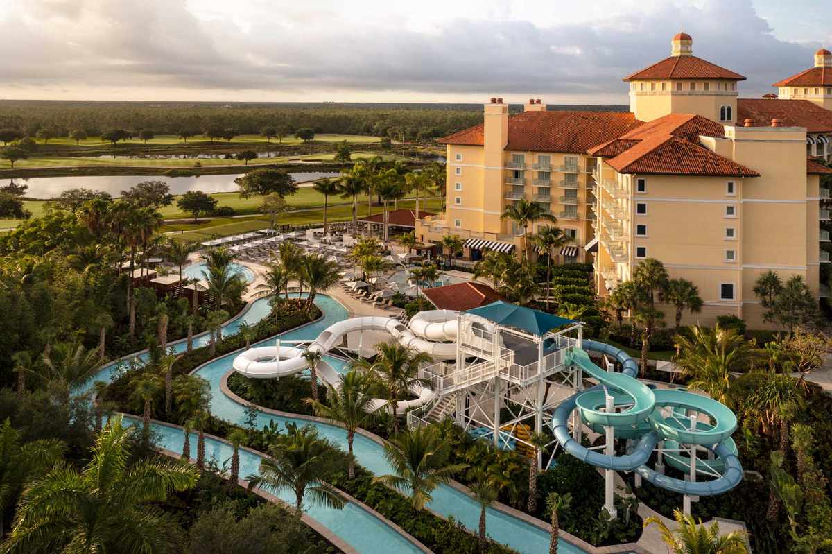 Aerial view of The Ritz-Carlton Golf Resort in Naples, Florida showing gold course and water park