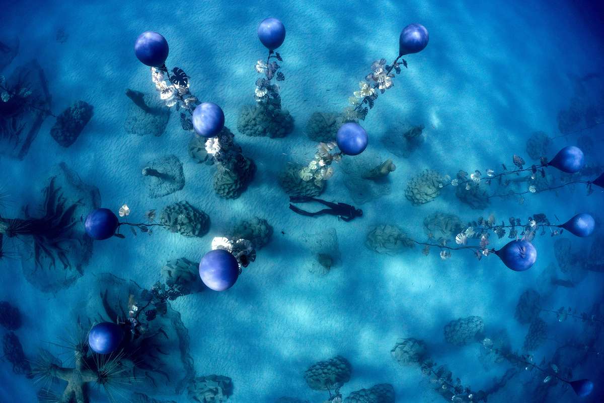 Cypriot freediver Angelos Savvas swims through the MUSAN underwater sculpture park in Ayia Napa, Cyprus