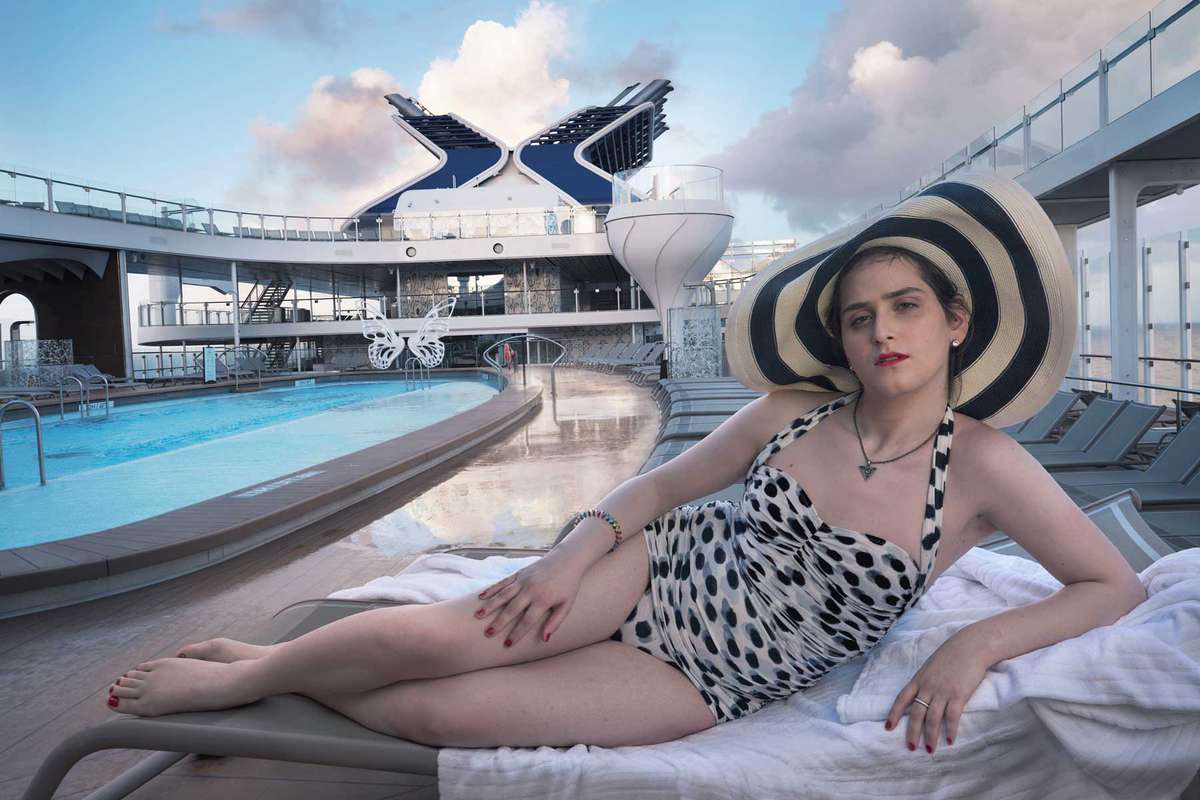 Abby Chava Stein, an American transgender author, activist, blogger, model, speaker and rabbi, relaxes on the Resort Deck of Celebrity Apex. Abby is the first openly transgender woman raised in an Hasidic community. Photographed by Annie Le