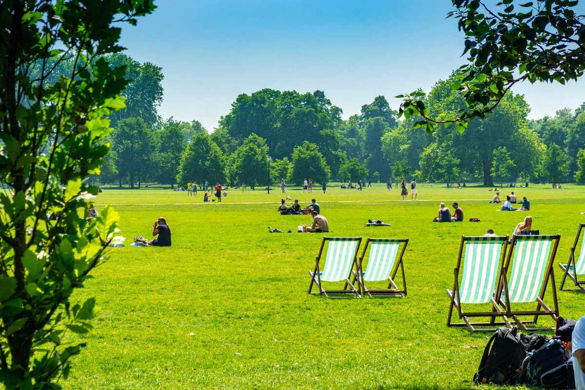 Tourists and locals relaxing on Hampstead Heath, London