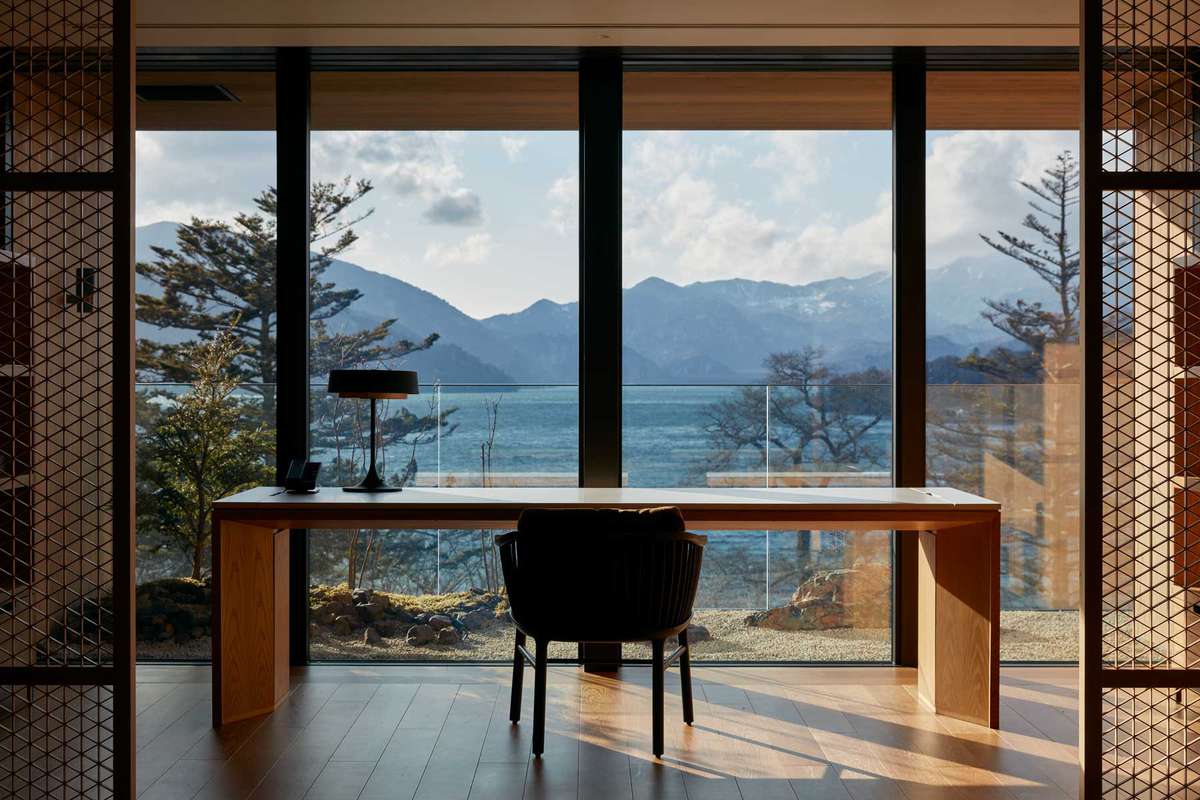 Interior with mountains and lake in the background