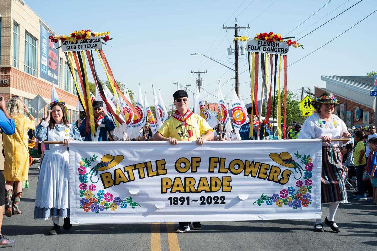 Belgian American Club of Texas starts off the Battle of Flowers Parade.