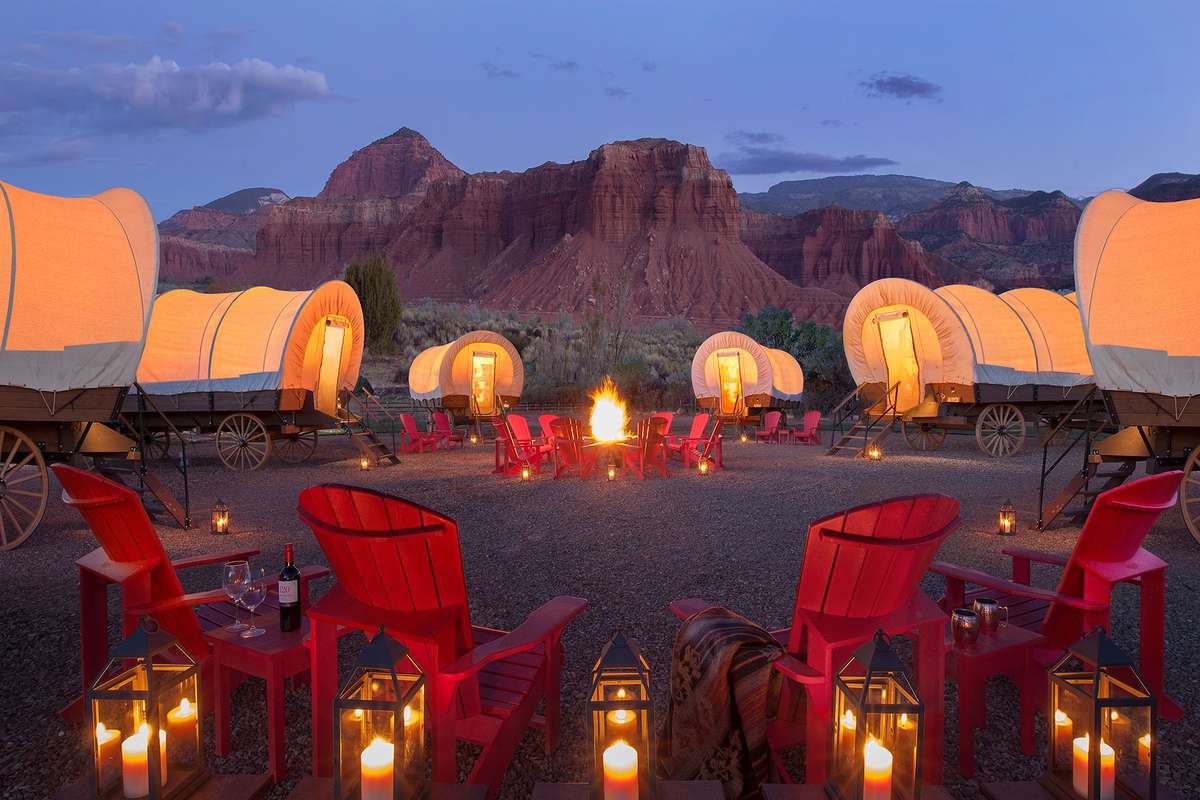 The Covered Wagons around a firepit at Capitol Reef Resort