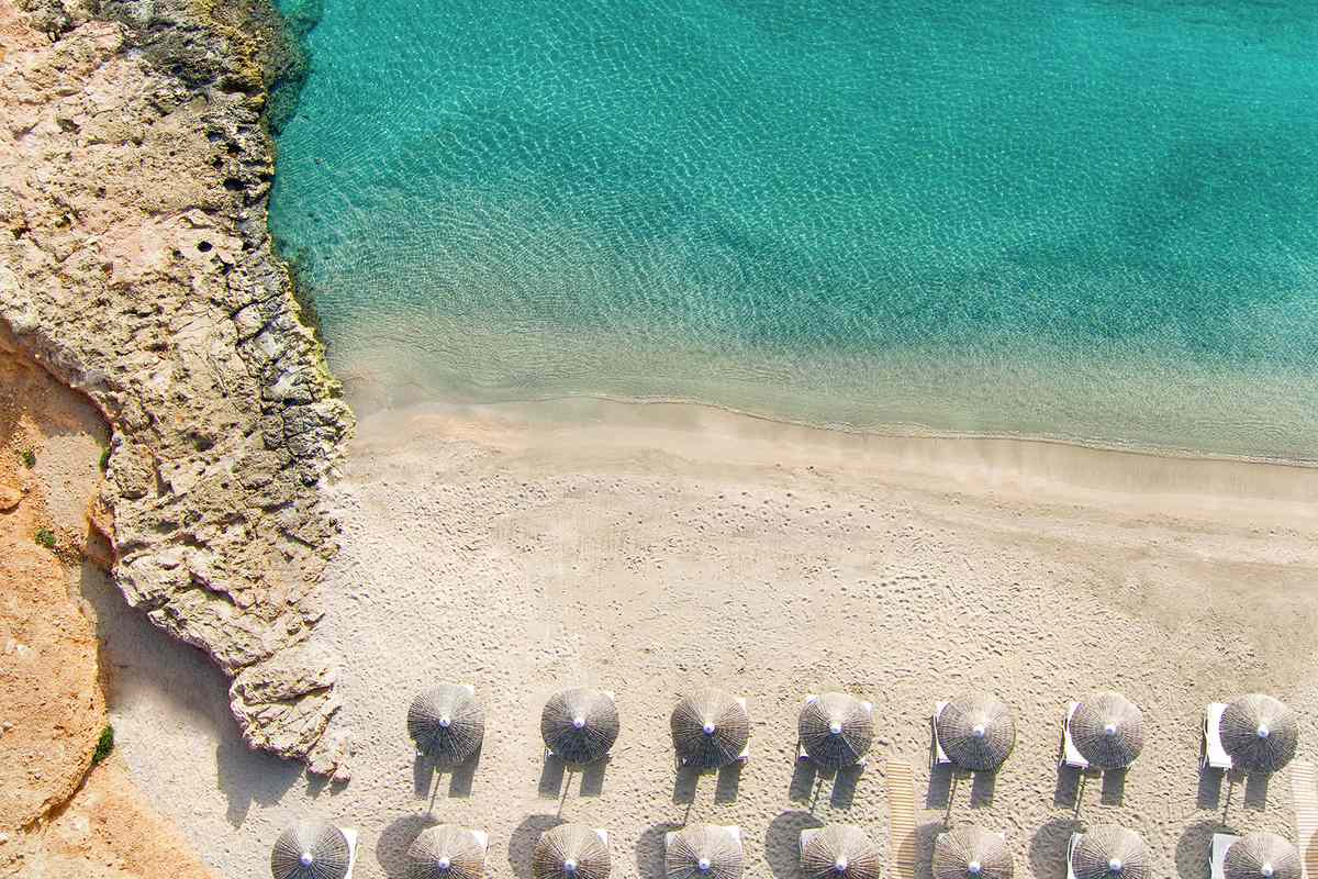 Aerial of the beach at Daios Cove Luxury Resort & Villas