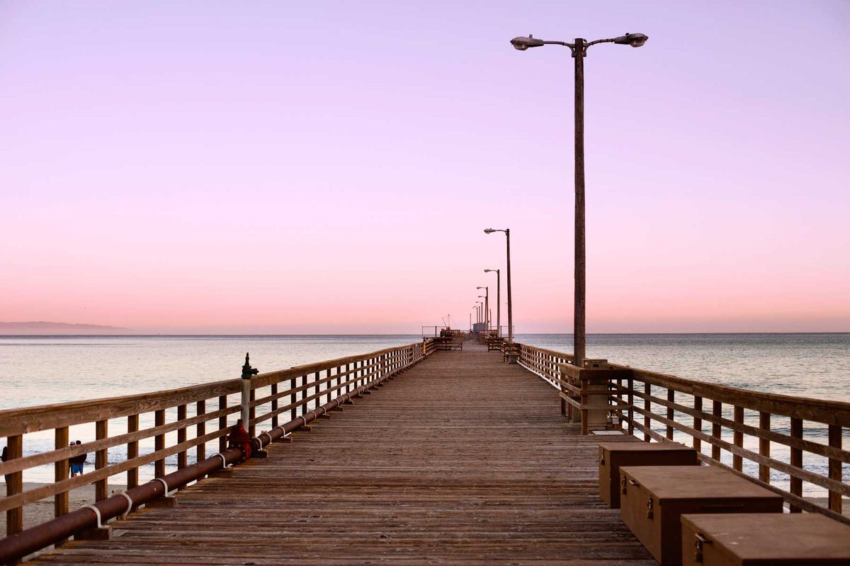 Avila Beach Pier at Dusk with pink and purple hued skies