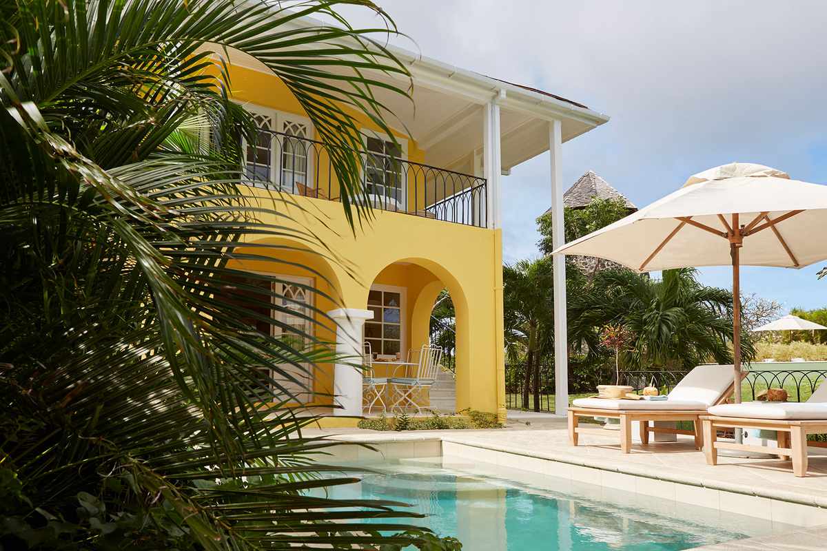 Exterior of the deluxe accommodations at The Cotton House on Mustique Island