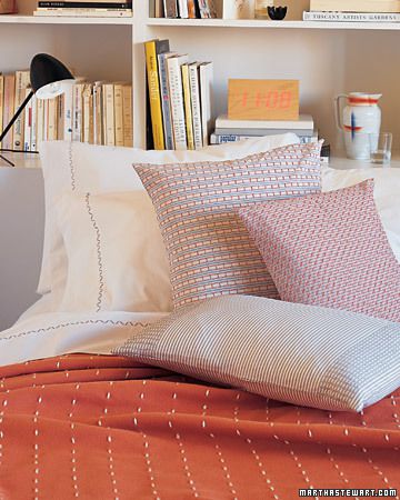 Bedding and Pillows with Stitched Designs