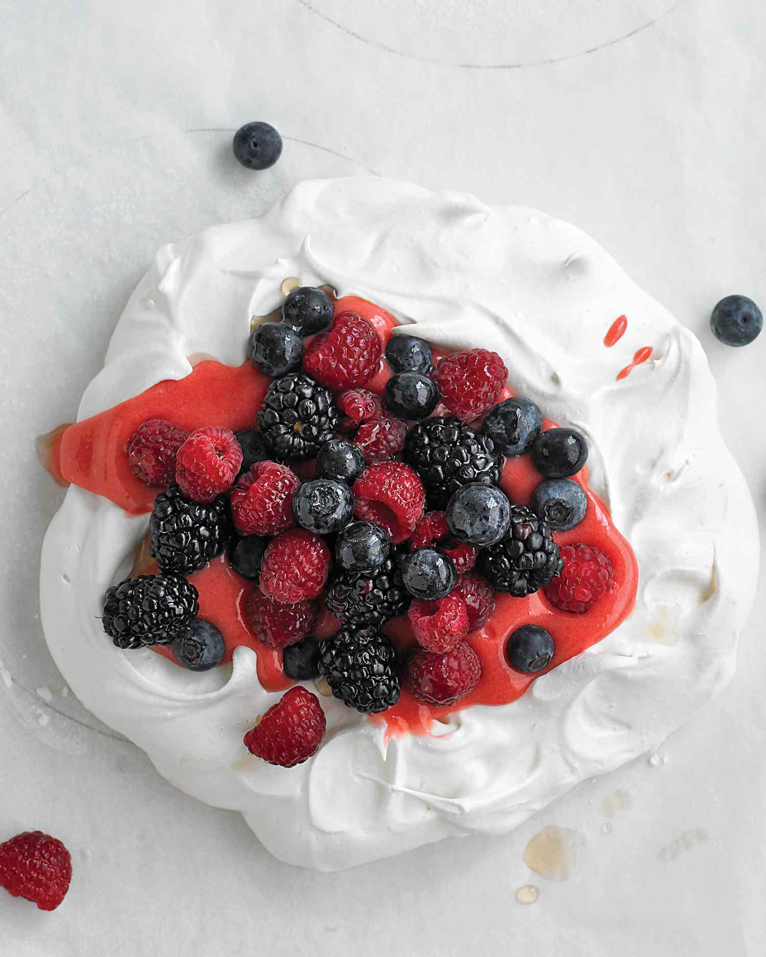Pavlova with Raspberry Curd and Berries