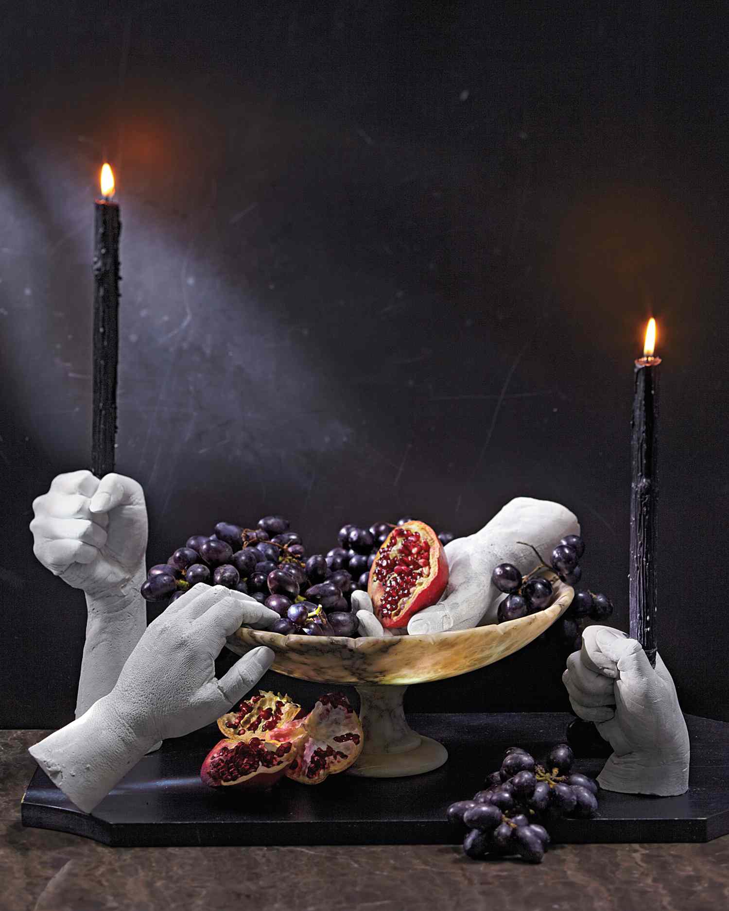 <p>Give your tablescape a ghostly touch by making these eery decorations out of molds of your own hand. To turn them into taper candleholders, hold a candle in your hand, keeping it straight—then carefully remove candle the candle and place your hand into the mold mixture.</p>
                            