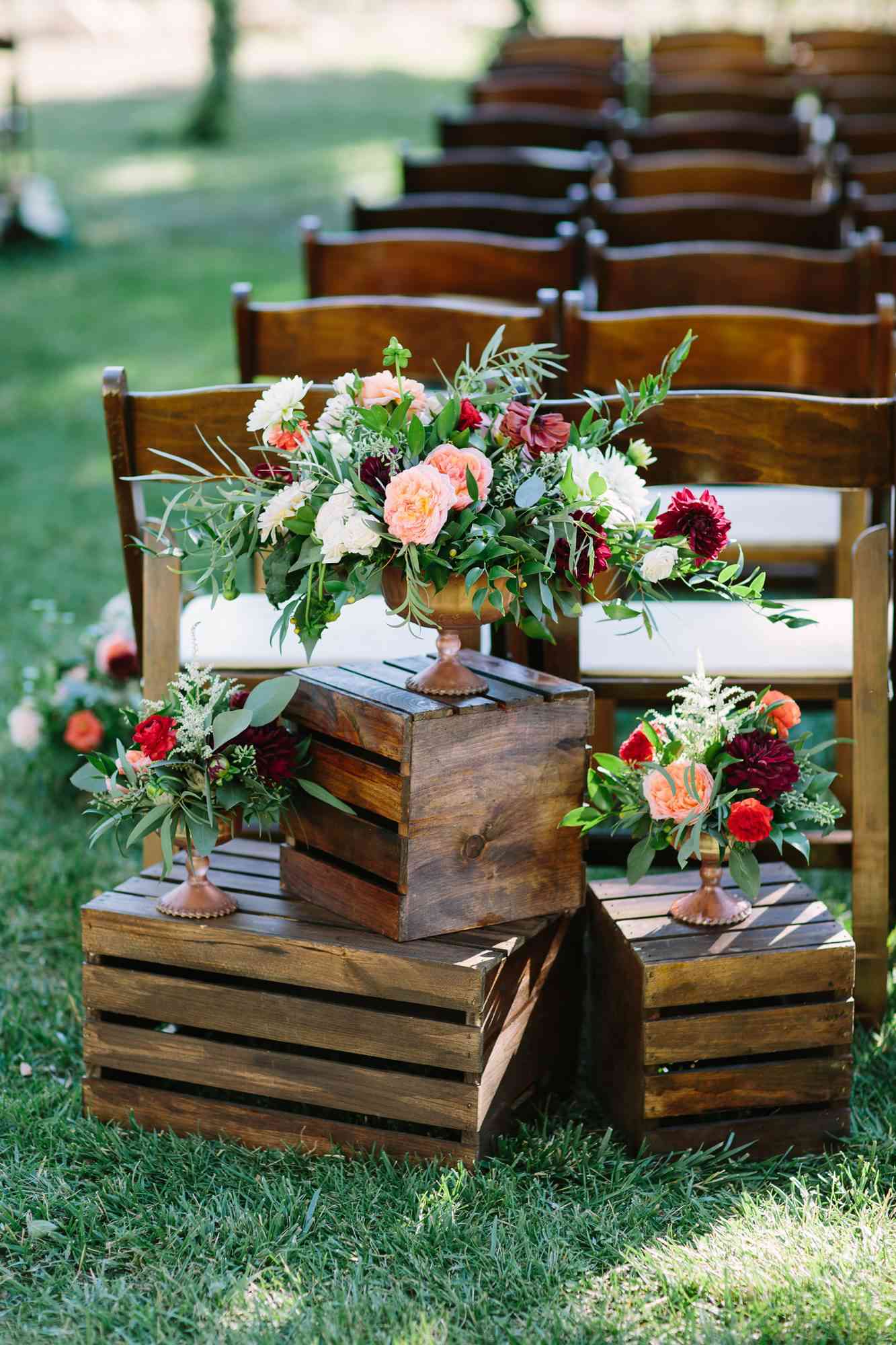 floral decorations sitting on crates