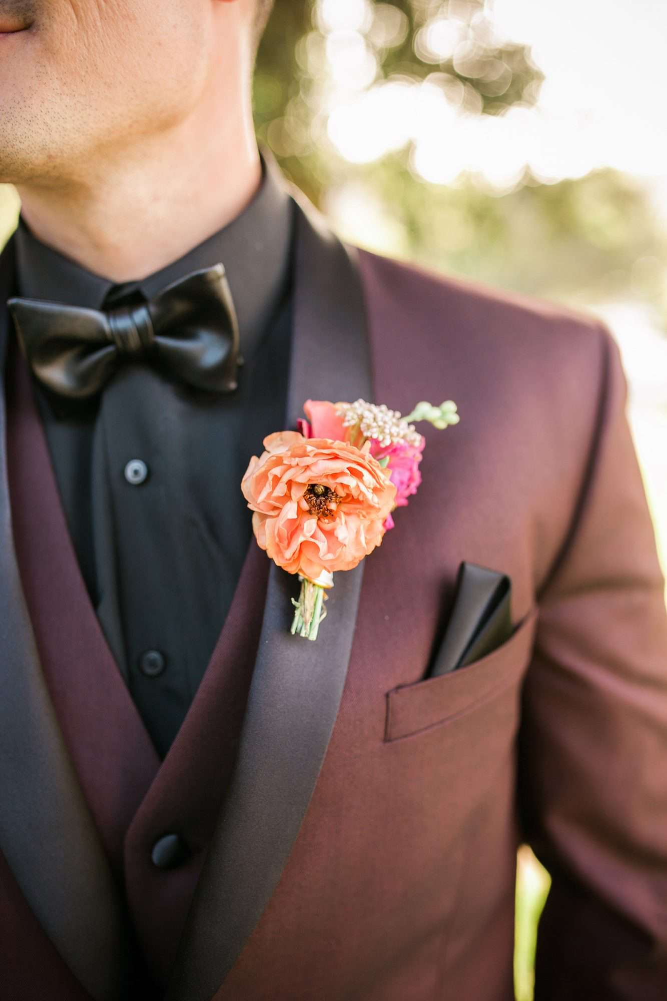 pink and orange boutonniere