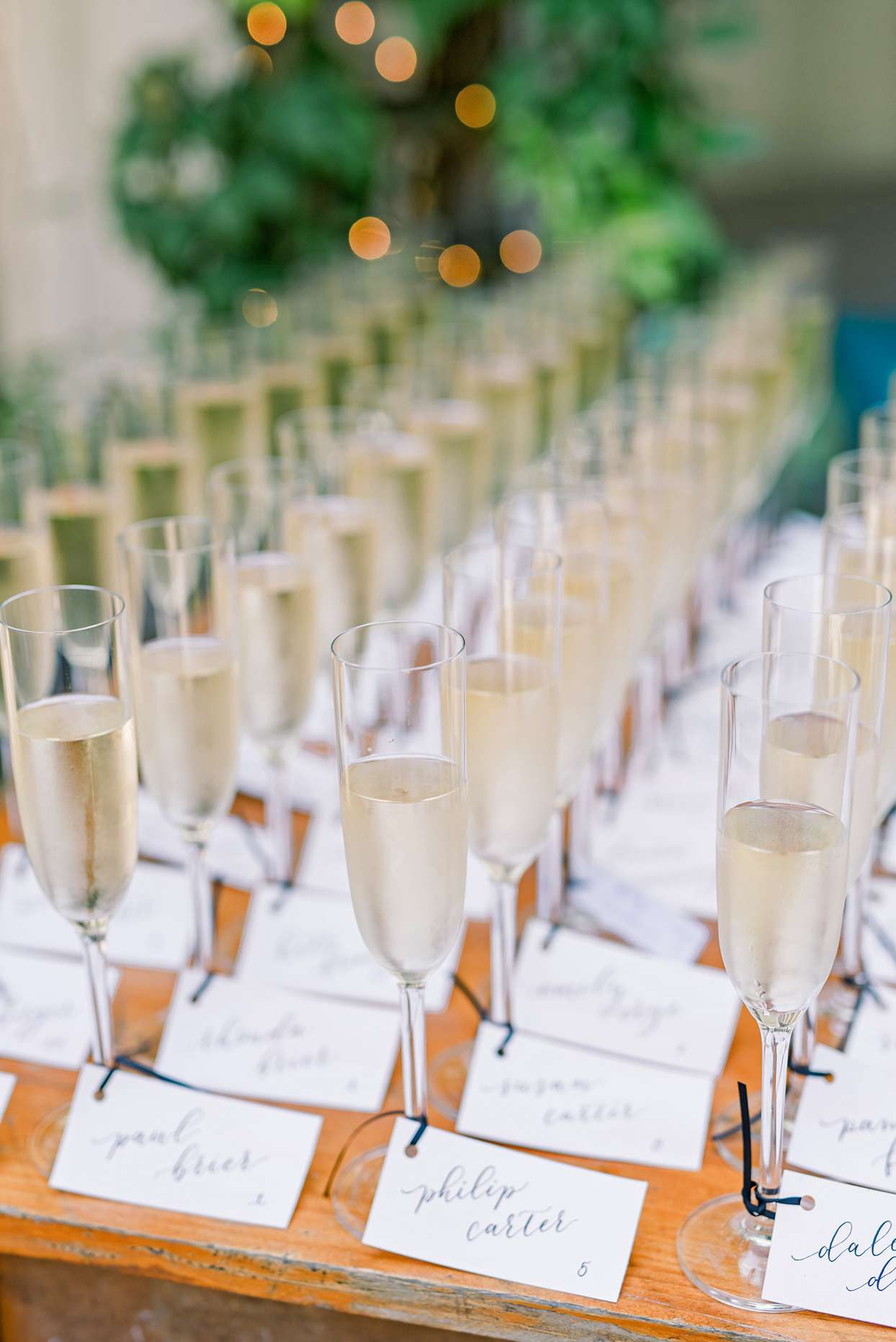 champagne wedding ideas glasses with nametags