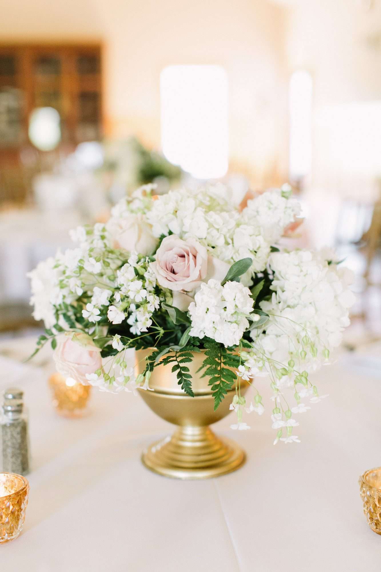 glamorous wedding ideas gold vessel floral arrangement