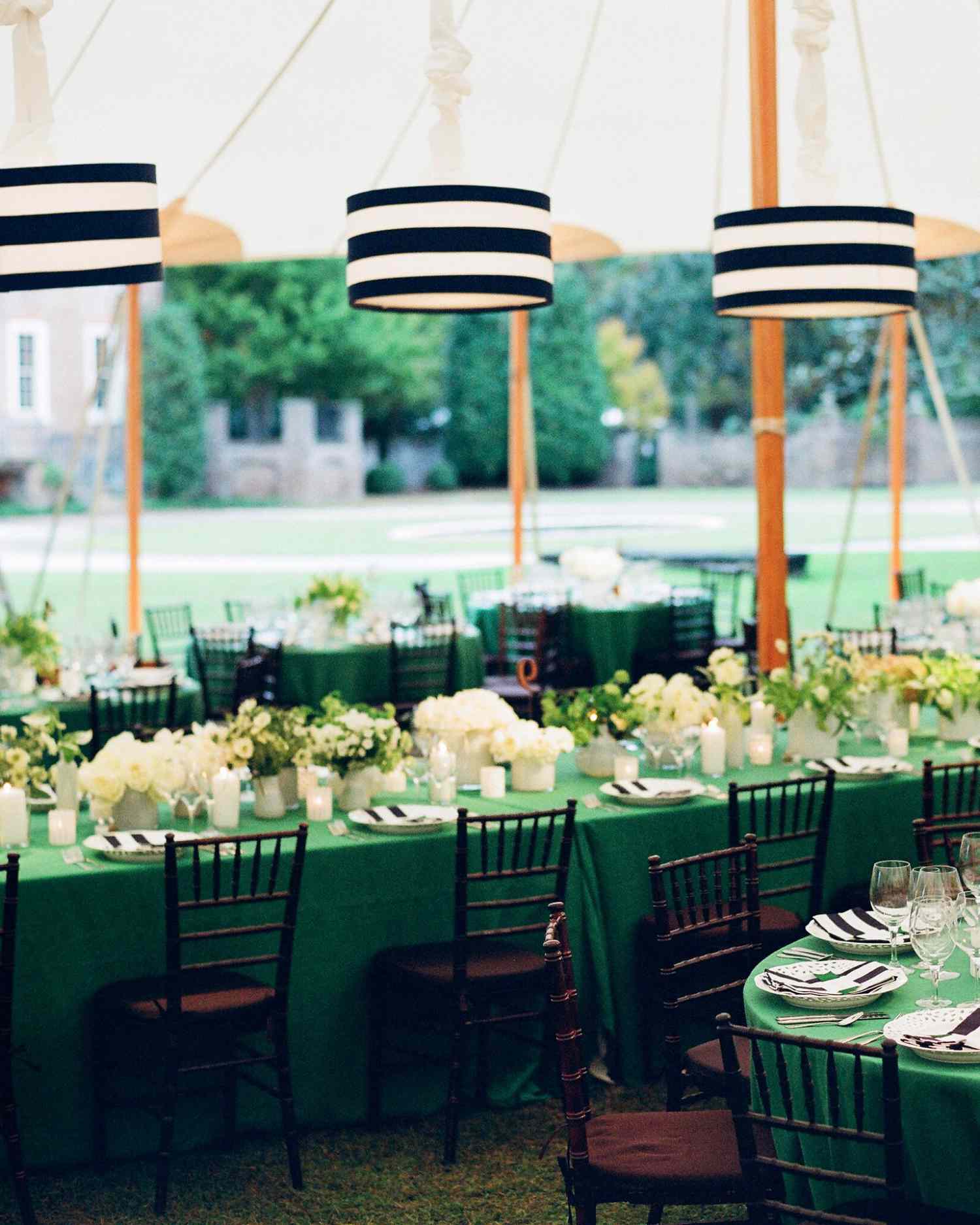 striped napkins and lamp shades over green tables
