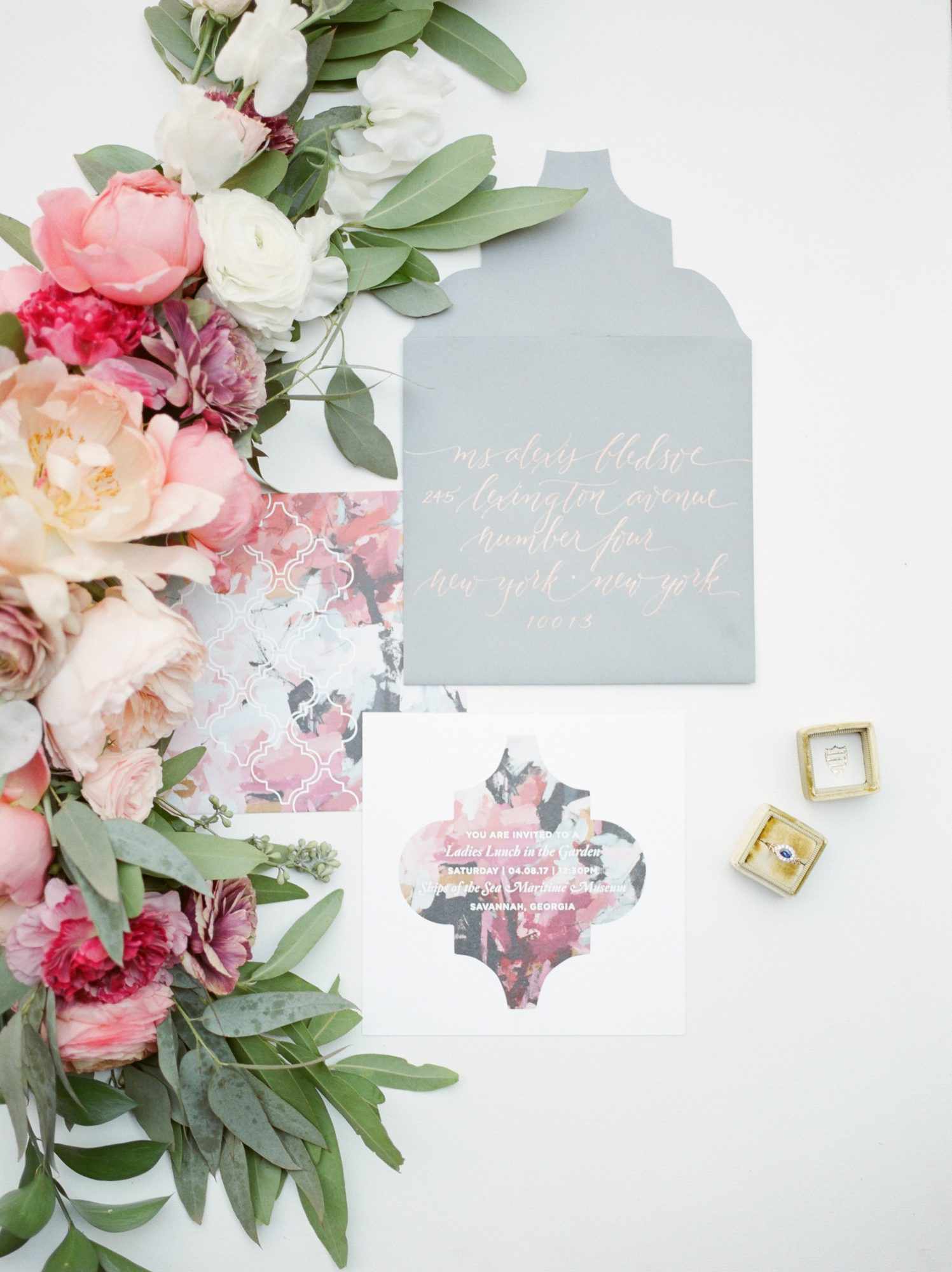 Gray and pink floral invitation suite with bright pink floral garland