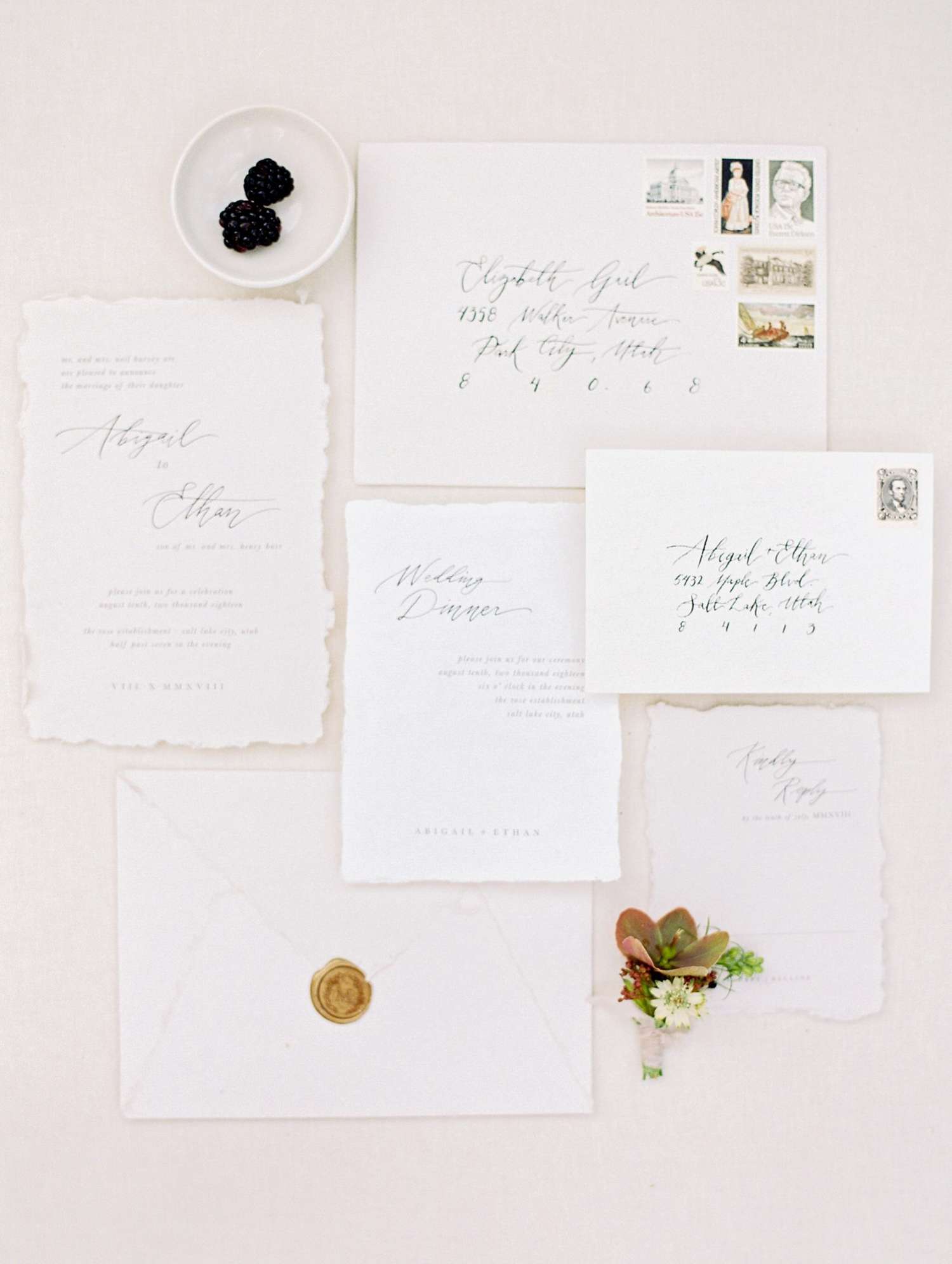 all white vintage invite with black calligraphy