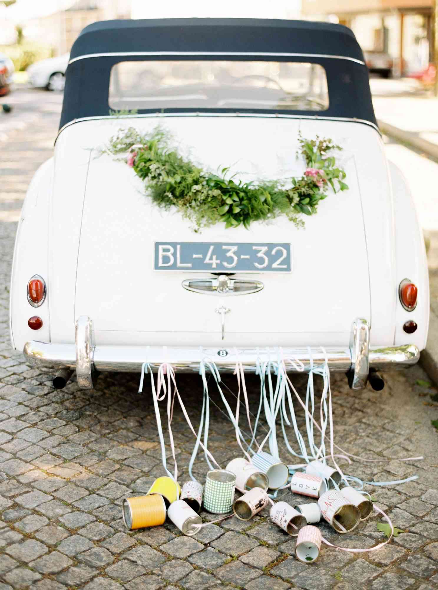 wedding getaway car with cans