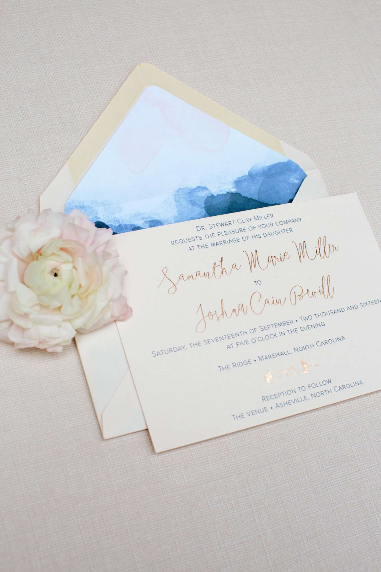 wedding invitation with blue envelope liner