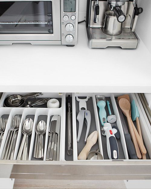 How do I keep my kitchen drawers better organized? I've tried using utensil holders, but the drawers still become disorganized! --Michelle