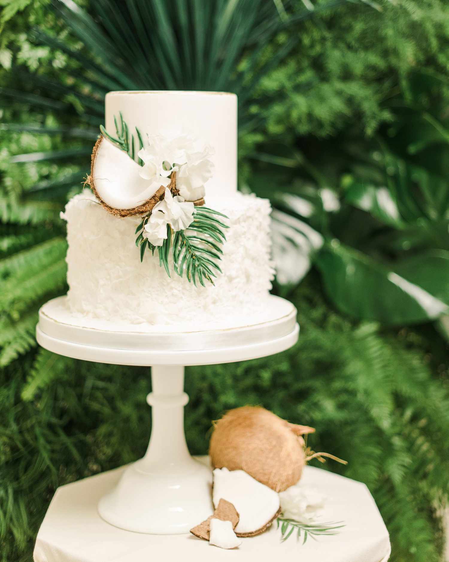 tropical wedding cake with coconut details