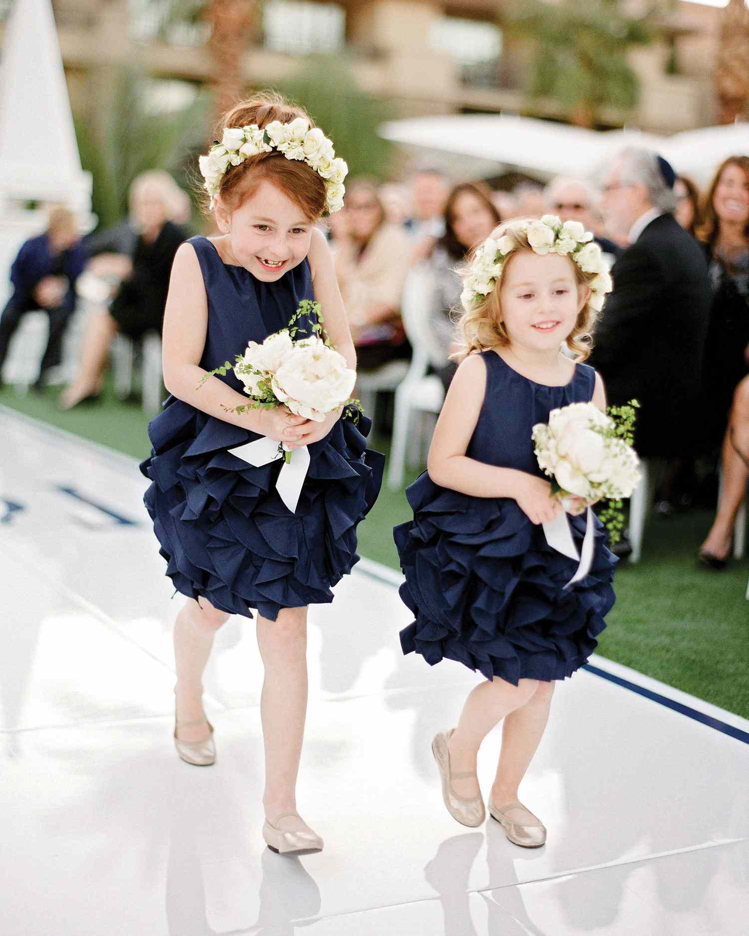 tali-mike-real-wedding-flower-girls-walking-down-aisle.jpg