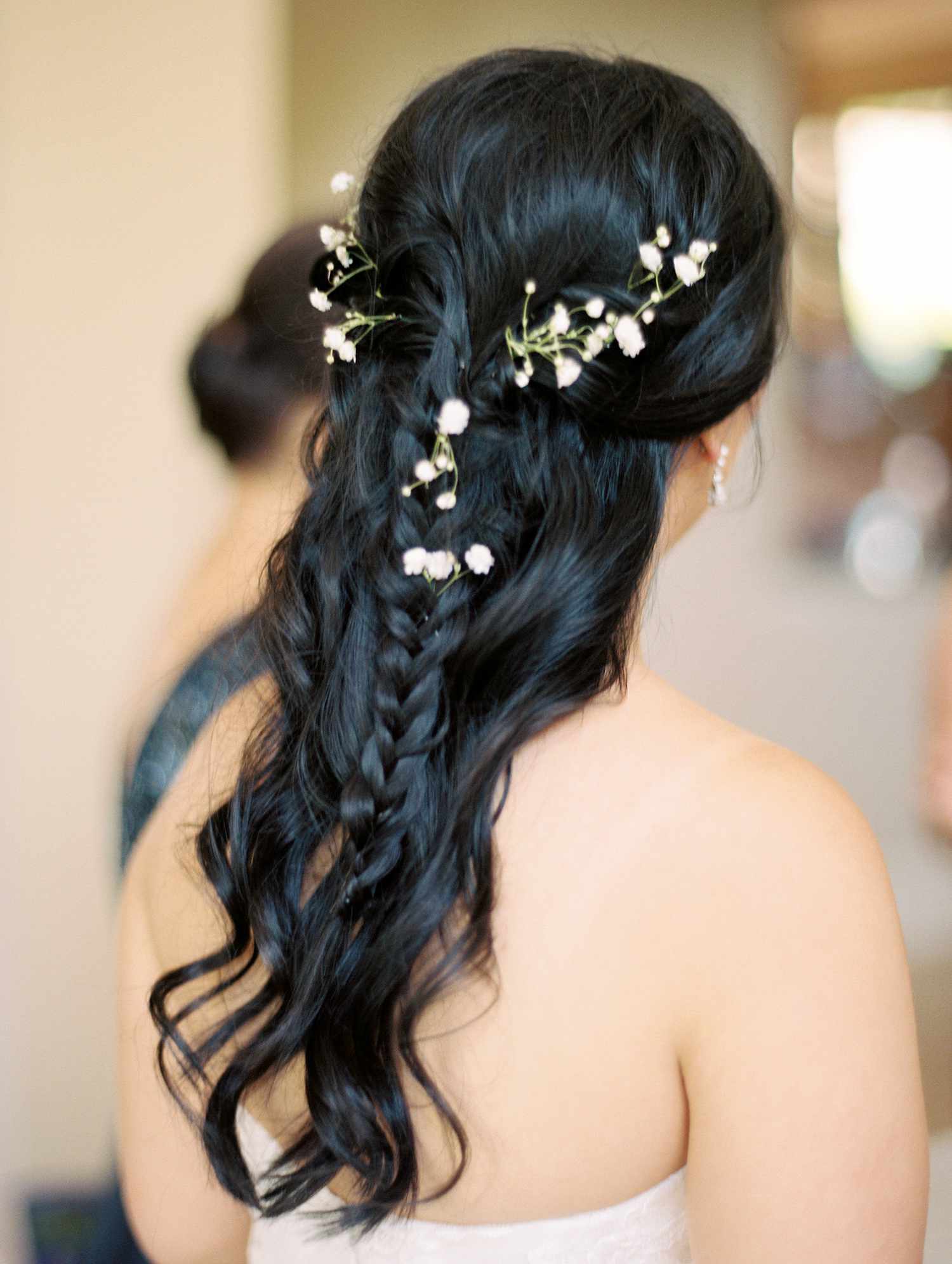 bride with half updo and braid