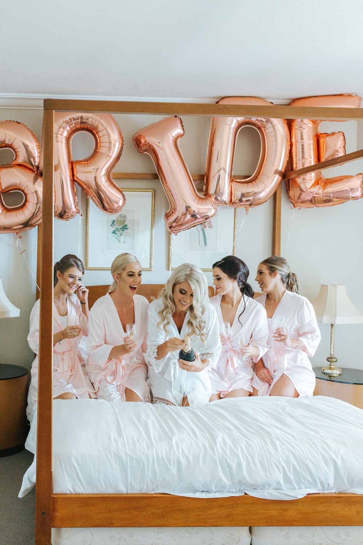 rose gold wedding ideas wedding balloons spelling out bride