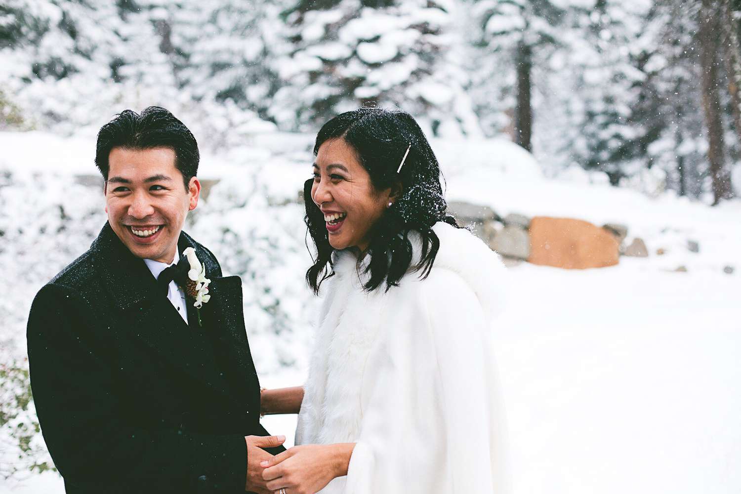 Snowy Wedding Photo with Bride and Groom