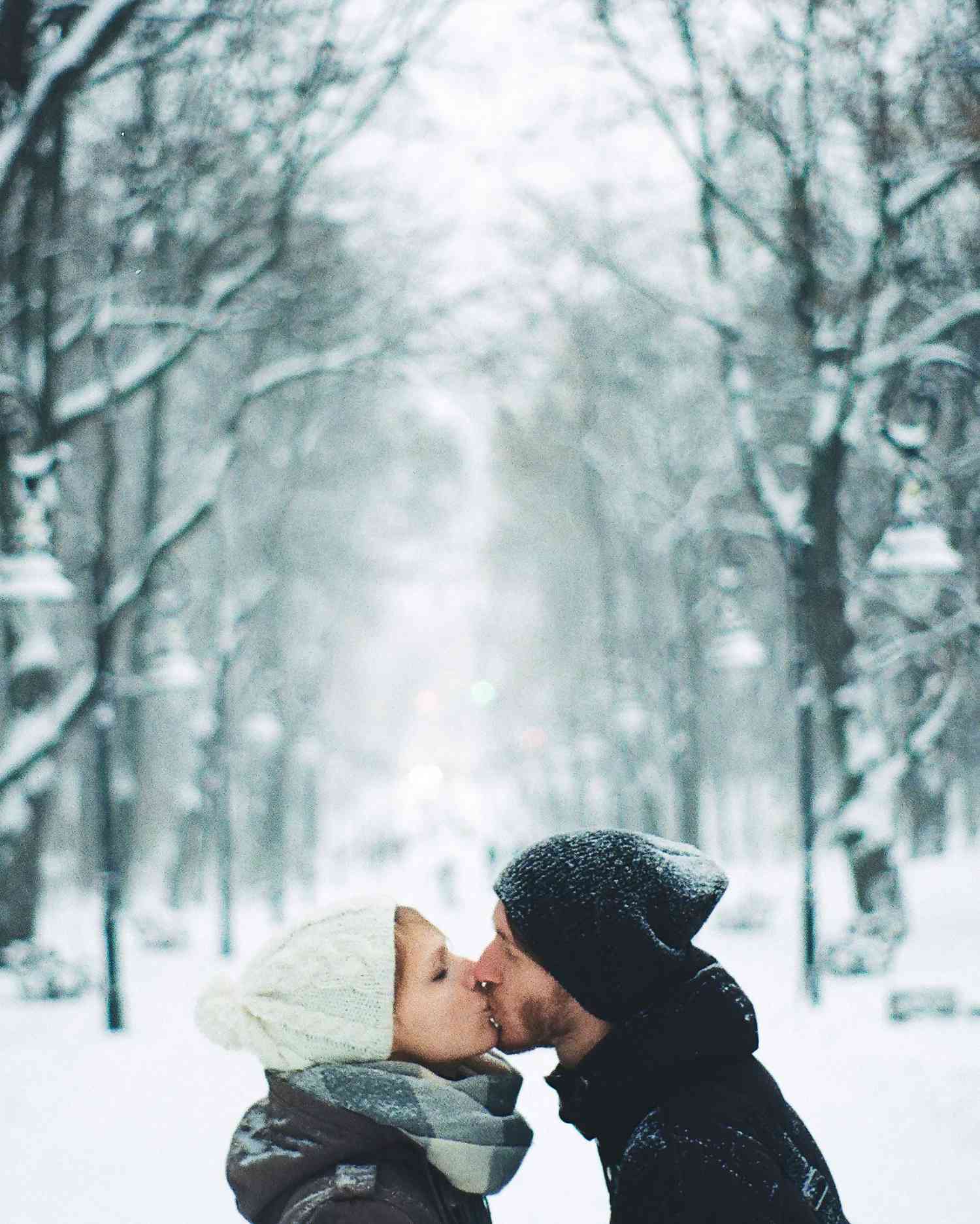 winter-date-nights-couple-kissing-snow-1215.jpg