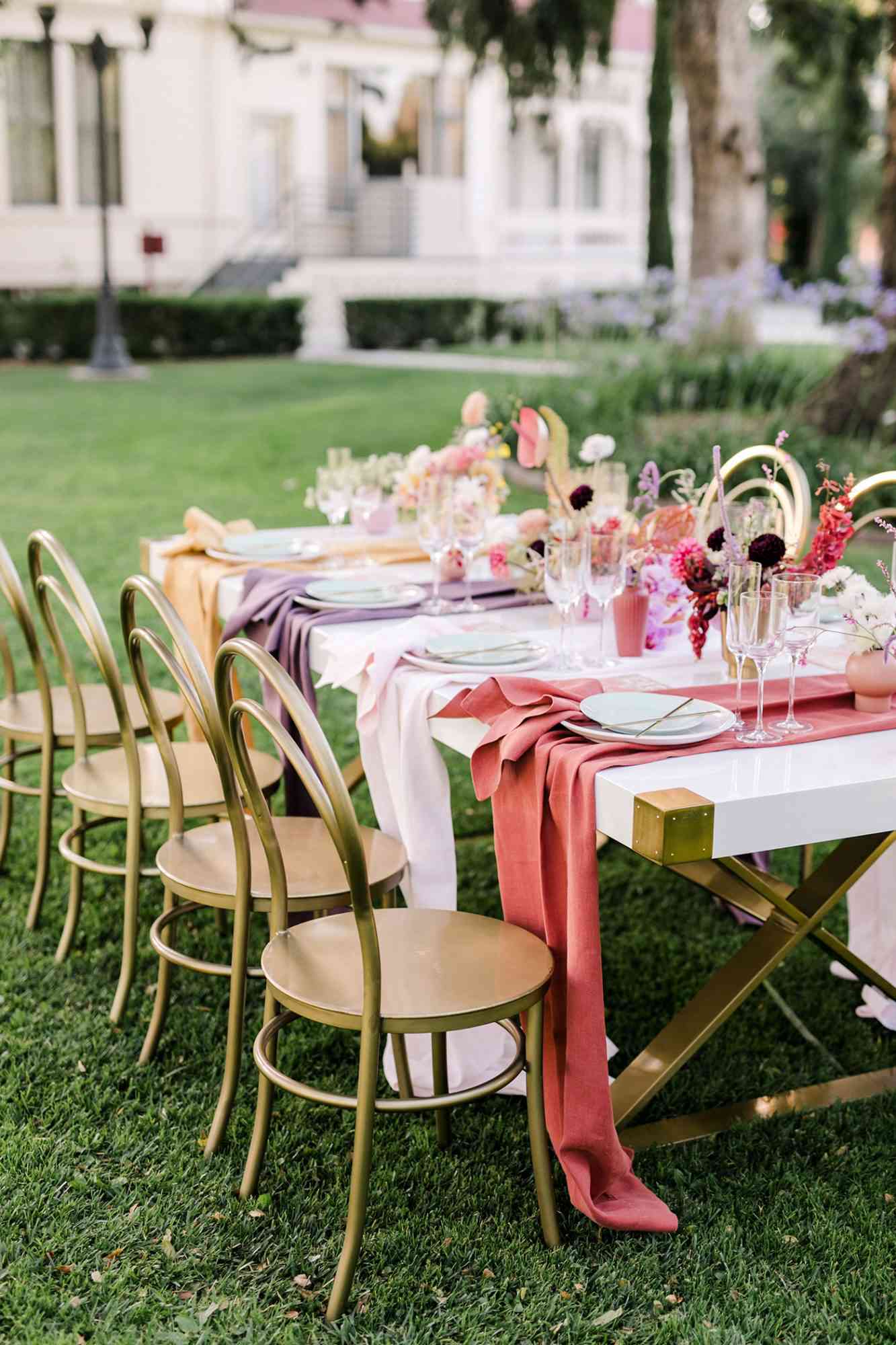 unique wedding color palettes pink table setting outdoors