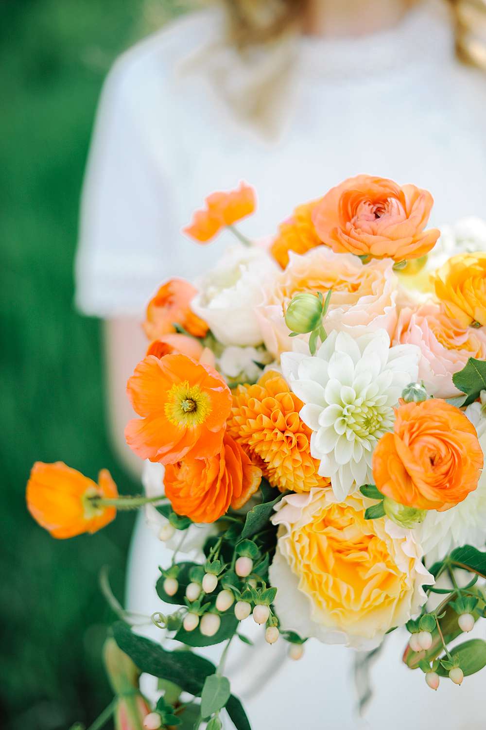 monochromatic bouquet bright orange flowers
