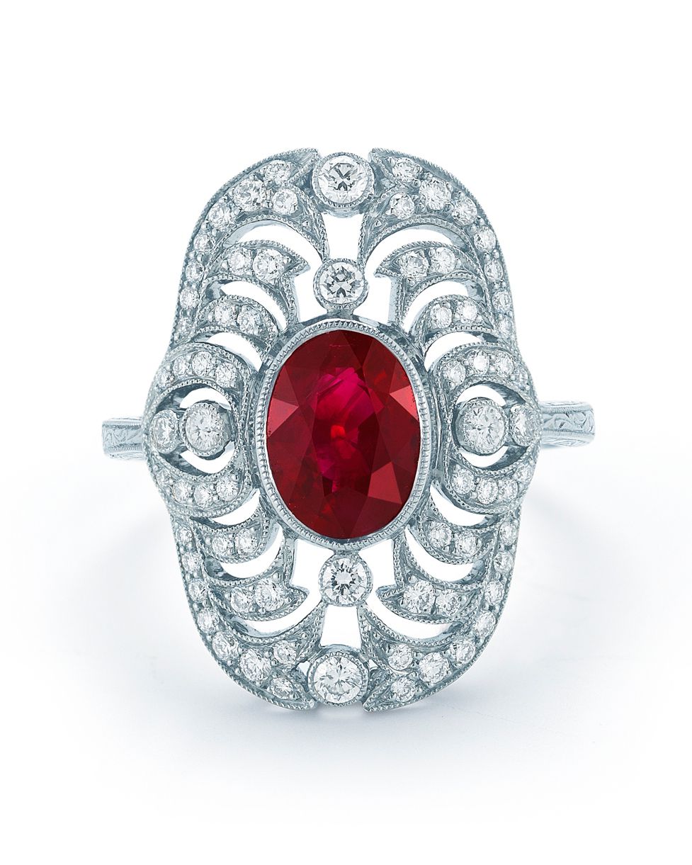Vintage Ruby Engagement Ring with Intricate Diamond Border