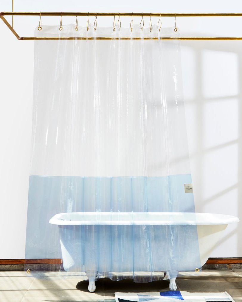 translucent show curtain around white tub