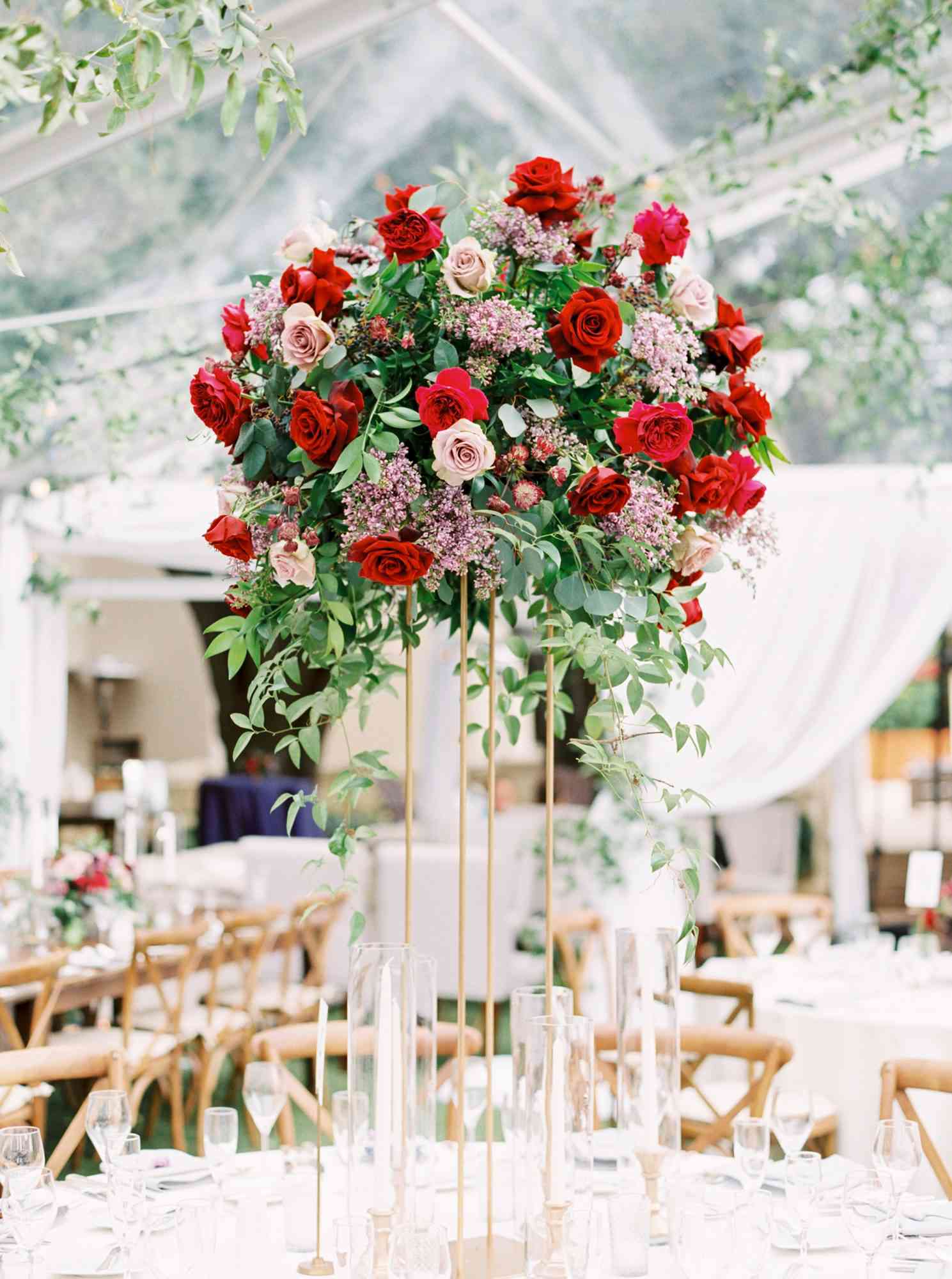 tall centerpiece with red and pink garden roses