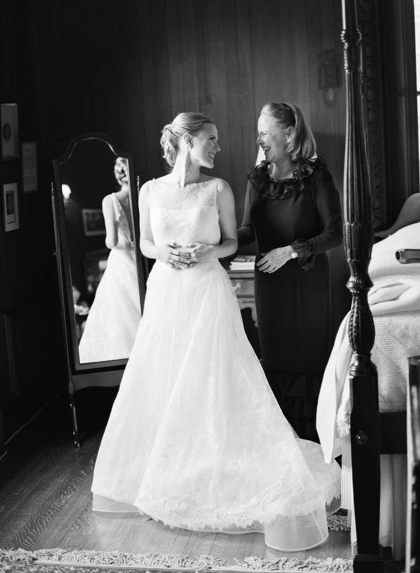 A Mother and Daughter Laughing Before a Wedding