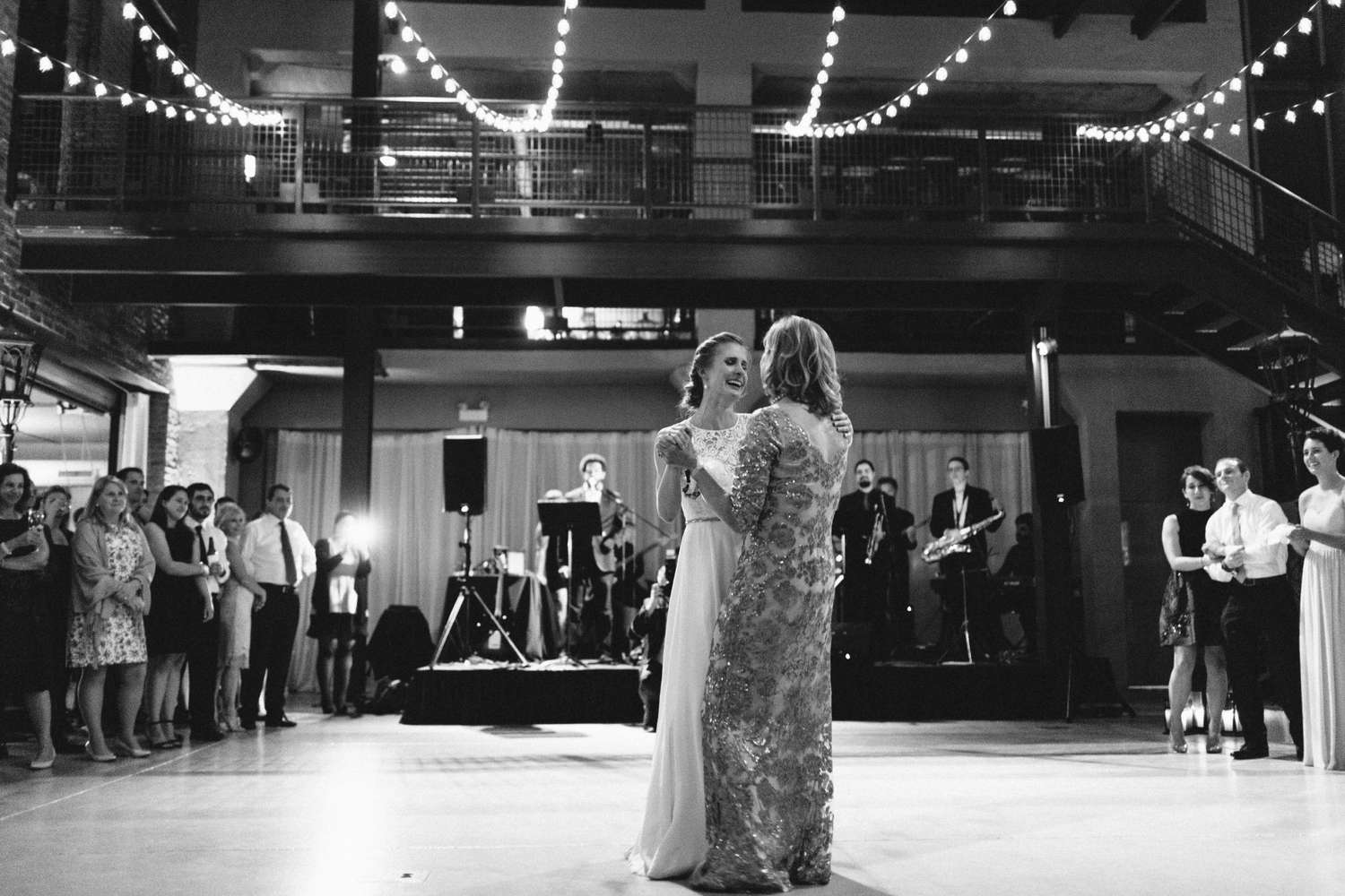 A Bride and Her Mother Dancing at Her Wedding Reception