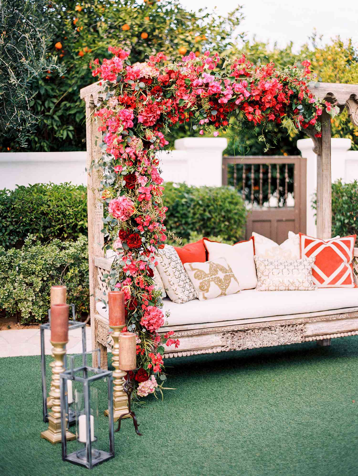 wedding lounge beige couch with flowering pergola